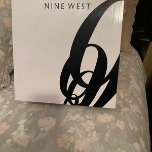 Brown Nine West Boots. Size 9. Worn less than 5 times. Minor scuffs.